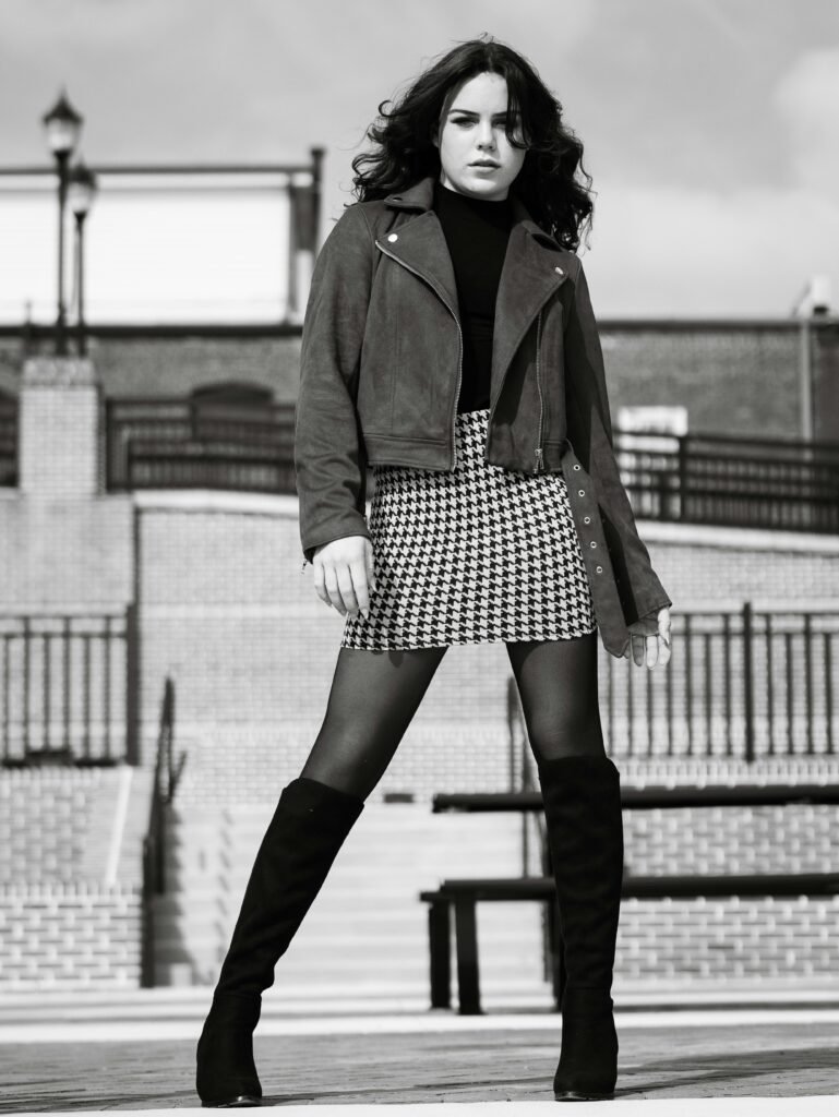 Stylish urban fashion portrait of a young woman in Atlanta, GA, with a vintage vibe.